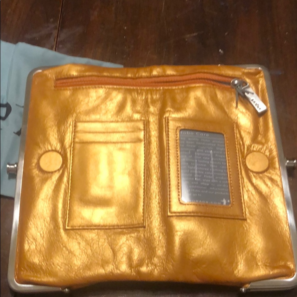 BRAND NEW ORANGE HOBO WALLET